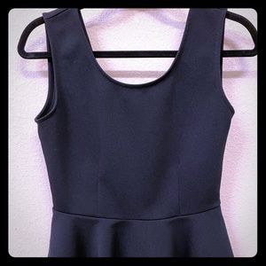 Plunge Back Peplum Top